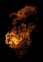 Fire and burning flame of explosive fireball isolated on dark background for abstract graphic design photo