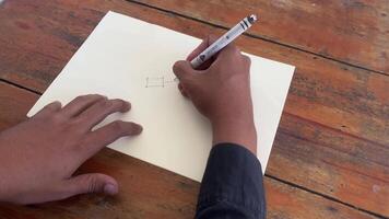 architect hand drawing sketch design architecture construction project building house. architect draw paper concept plan engineering blueprint home engineer industry professional. architectural. video