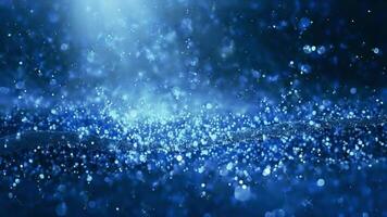 water drops background, blue glitter particles falling in light rays loop video