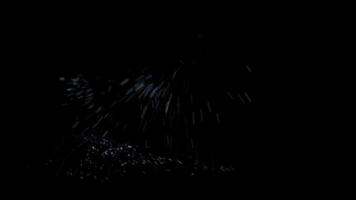 Particle Christmas Tree Merry Christmas Explode 4K Loop features animated snow particles flying into a black atmosphere and an erupting particle Christmas tree with a Merry Christmas message video