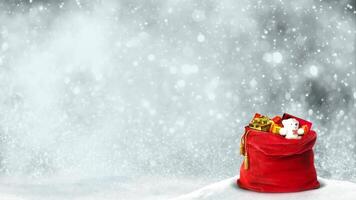 Santa Present Bag Swirl 4K Loop features a red Santa bag full of presents sitting in the snow with swirling snow, clouds, and glitter particles rising in the background in a loop. video