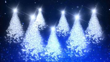 Christmas Tree Sparkle Blue Forest 4K Loop features multiple particle Christmas Trees floating in a blue atmosphere with particles floating up and snowflakes coming down in a loop video