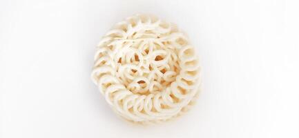 White noodle crackers or kerupuk putih or kerupuk warung made from tapioca flour, snack food from Indonesia isolated on white background photo
