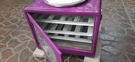 Oven cake flipper purple colors photo