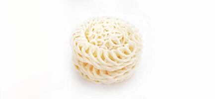 White noodle crackers or kerupuk putih or kerupuk warung made from tapioca flour, snack food from Indonesia isolated on white background photo