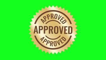 Golden approved stamp animation on greenscreen background video