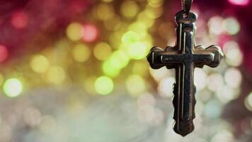 Christian Religion Holy Symbol Cross for Pray and Colorful Bokeh Behind video