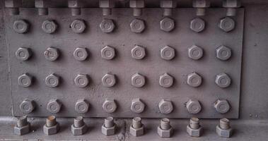 many bolts that hold the iron bridge photo