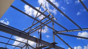 Steel Frame Construction Under Blue Sky photo