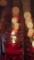 The flickering candles and warm bokeh lights create an enchanting, inviting atmosphere video