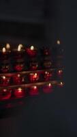 Illuminated candles create a soothing atmosphere in a serene setting that enhances beauty video