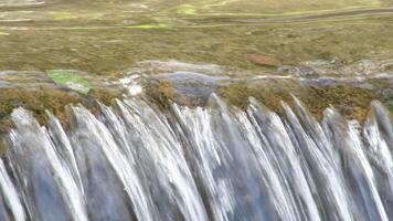 Pure mountain water running in a little waterfall stream video