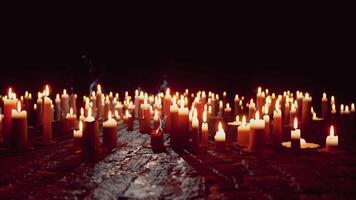 Multiple Candles Illuminated in Darkness video