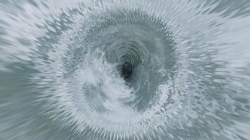 A circular object with a black hole in it video