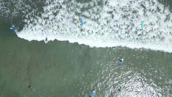 Aerial View Of People Taking Surfing Lessons In The Ocean, Bali, Indonesia. video