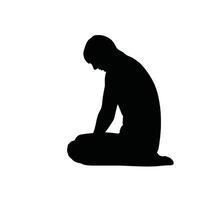 Silhouette of a man sitting on the floor vector