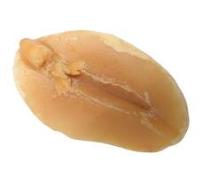 Half of roasted peeled peanut on isolated background photo