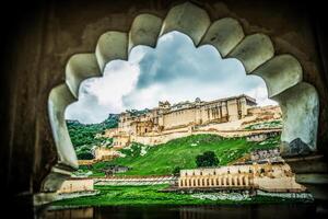 A view of the palace from inside an archway photo