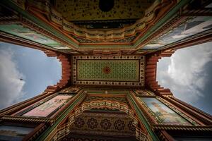 A view up at the ceiling of a building photo