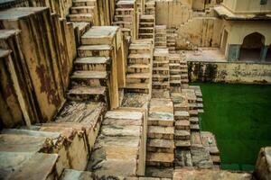 The steps leading to the water in the middle of the building photo