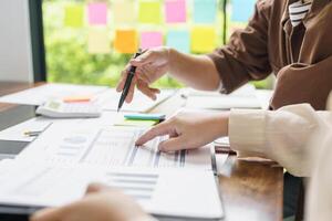 Business People brainstorming Meeting Design Ideas use post it notes to share idea professional investor start up project business brainstorming planning in office photo