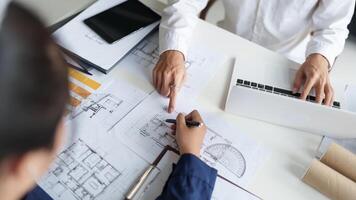 Architecture drawing on architectural project business architecture building construction Colleagues designer Planning Design on blueprint and compasses photo