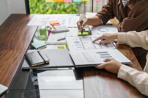 Business People brainstorming Meeting Design Ideas use post it notes to share idea professional investor start up project business brainstorming planning in office photo
