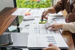 Business People brainstorming Meeting Design Ideas use post it notes to share idea professional investor start up project business brainstorming planning in office photo