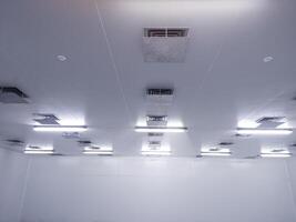 Ceiling of factory interrior ventilation with low temperature of an industrial cold storage room. photo