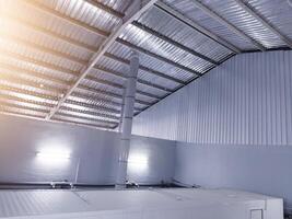 Building interior A pipe line system Air flow on the roof top the hatchery machine.with shiny light. photo