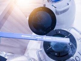 Check and measuring the Level of Liquid Nitrogen biological in container. photo