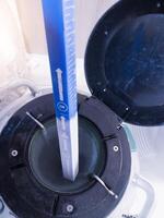 Check and measuring the Level of Liquid Nitrogen biological in container. photo
