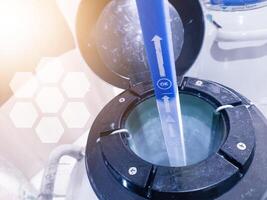 Check and measuring the Level of Liquid Nitrogen biological in container. photo