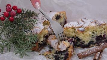 holly berries in pies Pandoro and Panettone cake traditional Italian Christmas sweets on wooden background copy space. video