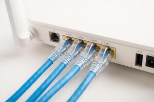 Ethernet cable with wireless router connect to internet service provider internet network. photo