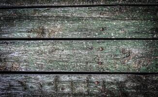 the texture of an old horizontal wooden shield photo