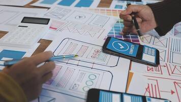 Young Asian business creative team work together, mobile application software design project. Brainstorm meeting, internet technology, smartphone web app designer, office coworker teamwork concept video