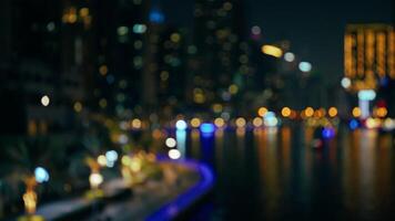 Blurred Illuminated City With Skyscraper In The Night video