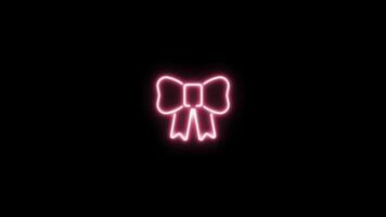 Neon sign in bow shape motion graphic with alpha channel. Pink ribbon neon light turn on and turn off isolated icon animated on transparent background. video