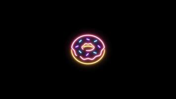 Neon sign in donut shape motion graphic with alpha channel. Colored doughnut neon light turn on and turn off isolated icon animated on transparent background. video