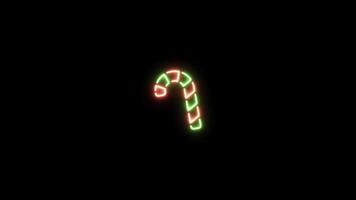 Neon sign in candy cane shape motion graphic with alpha channel. Colored candy neon light turn on and turn off isolated icon animated on transparent background. video