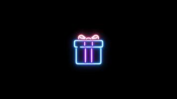 Neon sign in gift box shape motion graphic with alpha channel. Colored present neon light turn on and turn off isolated icon animated on transparent background. video