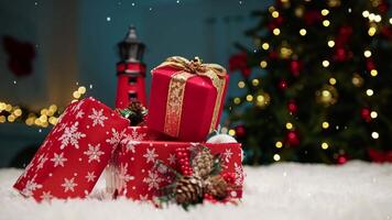 Christmas Presents With Snow Falling Near The Tree video
