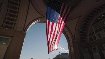A giant American flag hangs from the rotunda at Rowes Wharf in Boston, Massachusetts. video