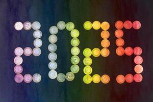 Happy New Year 2025 Idea. Transition from 2024 to new year 2025 concept with text coins. Creative Concept. photo