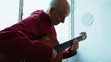 Retired Man Playing Guitar As Hobby video