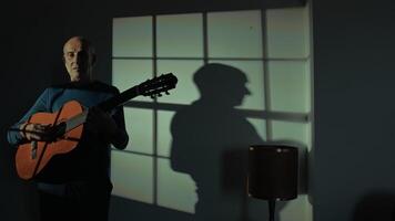 Artistic Performance Of An Old Composer With Guitar video