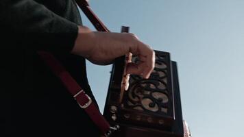 Fast Accordion Player Playing With Blue Sky Surrounding video