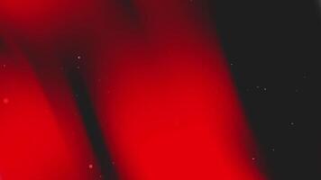 Red and black gradient background with small white dots video