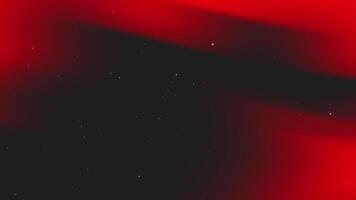 Red and black gradient background with scattered dots. video